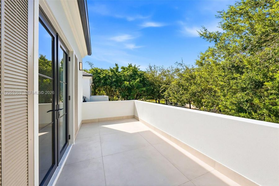 Exterior details and patio area of a home in , Coral Gables (Image 29).