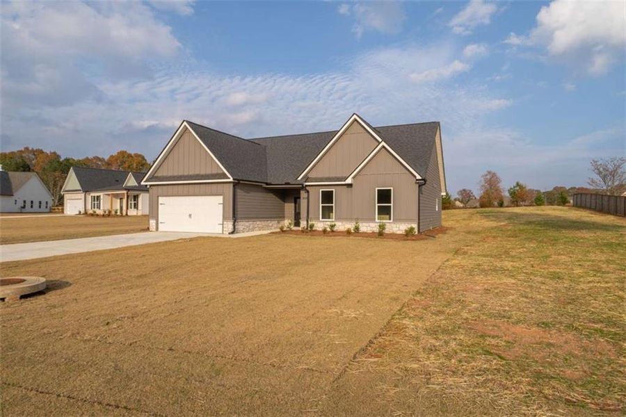 Front exterior of a new home in , Good Hope, GA, highlighting curb appeal (Image 19).