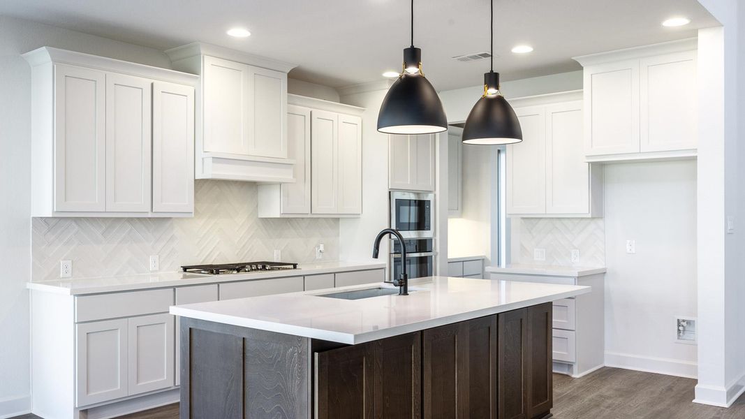 Furnished interior view inside a new home in Wolf Ranch 56', Georgetown (Image 5).