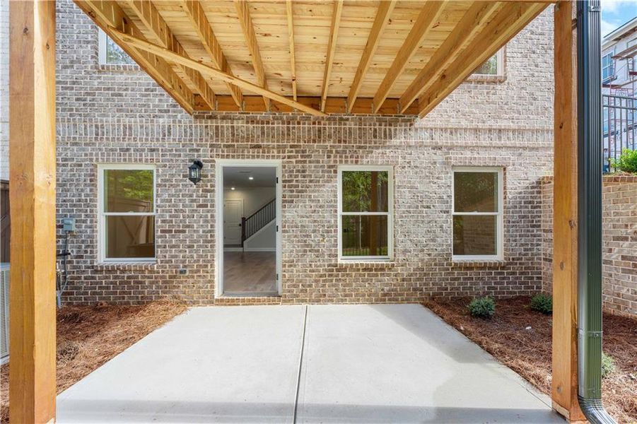 Exterior details and patio area of a home in Ward's Crossing Townhomes, Johns Creek (Image 32). Exterior details and patio area of a home in Ward's Crossing Townhomes, Johns Creek (Image 32).