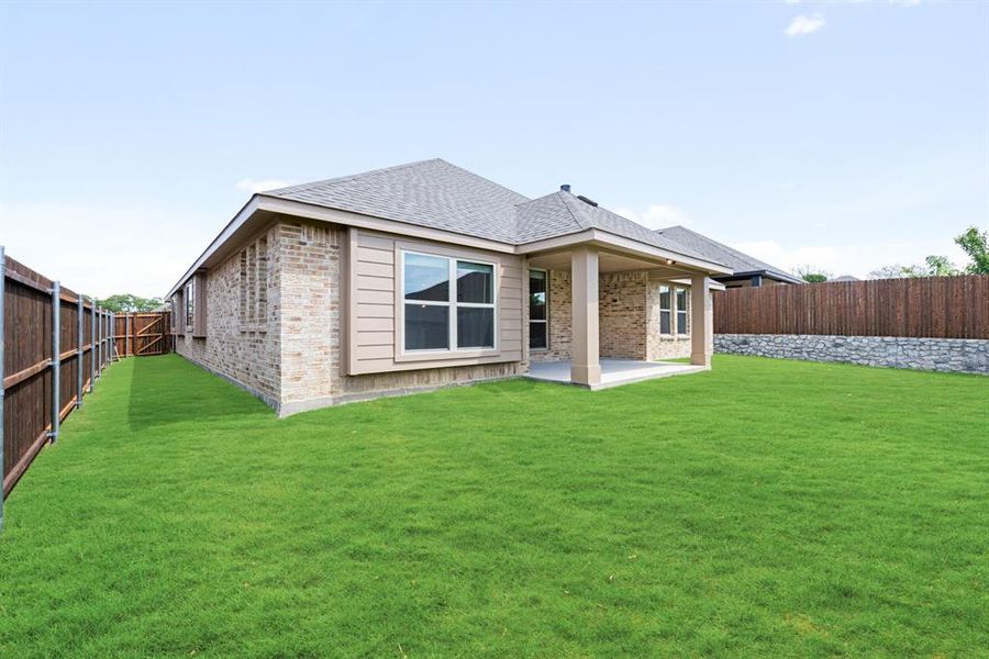 Exterior details and patio area of a home in Homestead at Daniel Farms, DeSoto (Image 4).