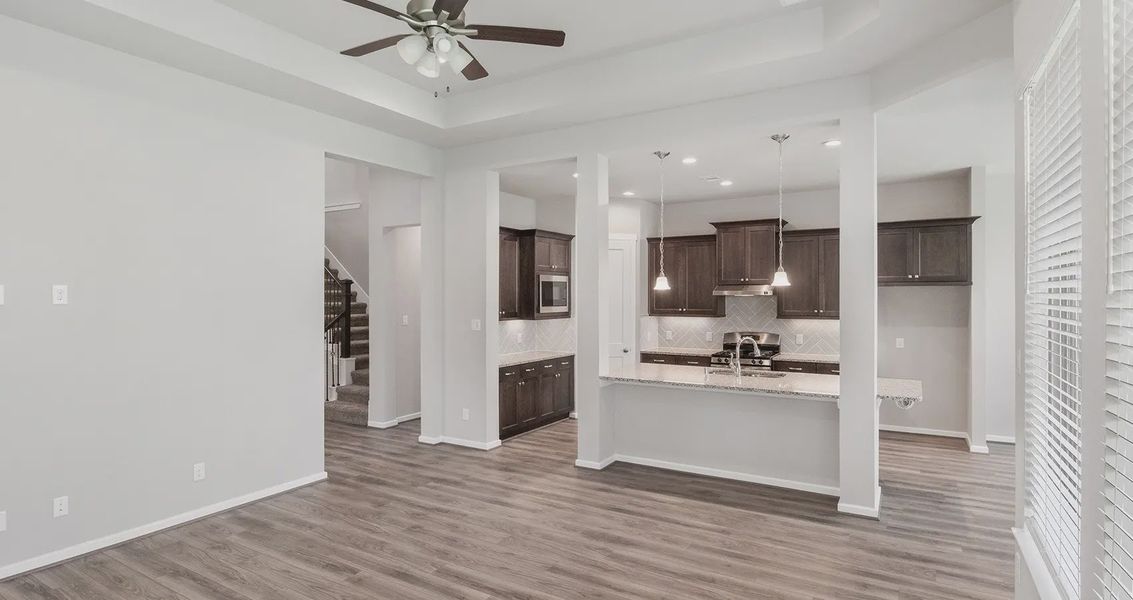 Representative furnished interior of a home built from the Pendleton by Chesmar Homes in The Woodlands Hills, Willis (Image 4).