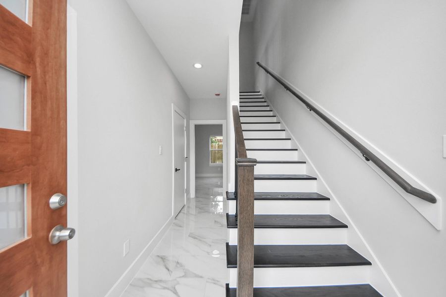 Entry foyer highlighting clean lines and natural light