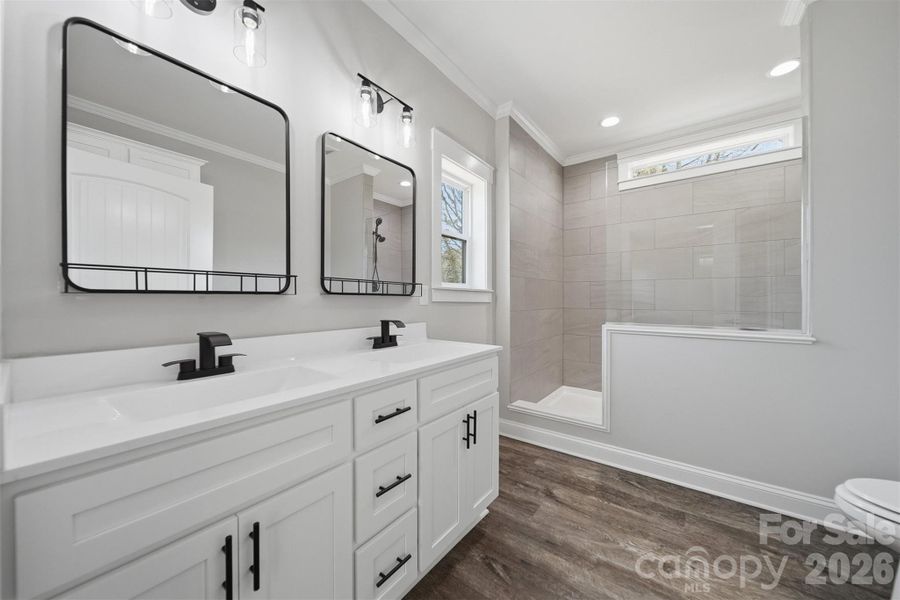 Furnished interior view inside a new home in , Lenoir (Image 13).