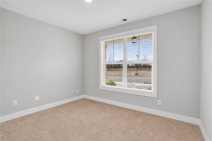 Spacious, unfurnished interior of a new home in The Fairways at Mirror Lake, Villa Rica (Image 16).