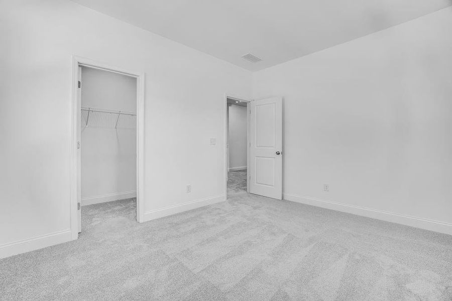 Spacious, unfurnished interior of a new home in Bailey Fence, Dacula (Image 24).