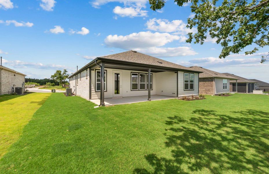 Front exterior of a new home in Sun City Texas, Georgetown, TX, highlighting curb appeal (Image 25). Front exterior of a new home in Sun City Texas, Georgetown, TX, highlighting curb appeal (Image 25).