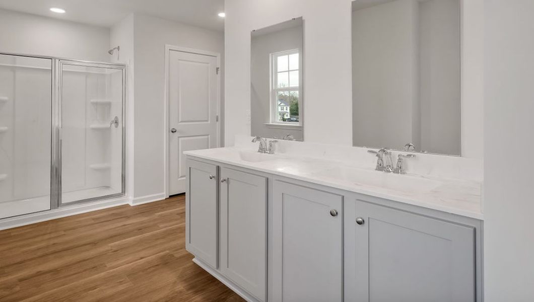 Representative furnished interior of a home built from the GLYNN by D.R. Horton in Grayson Park, Leland (Image 10).