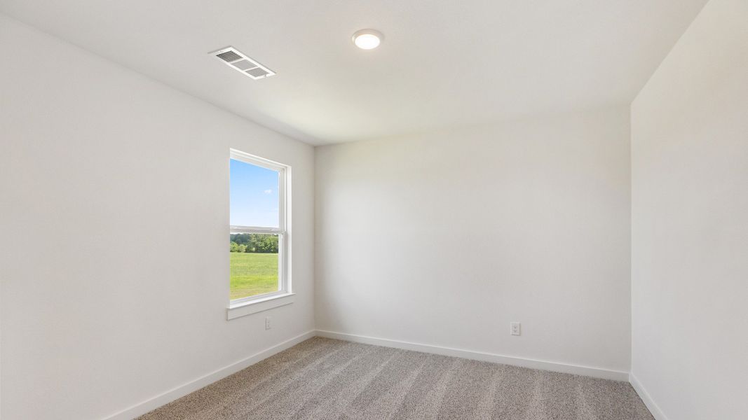 Furnished interior view inside a new home in Mostyn Springs, Magnolia (Image 24).