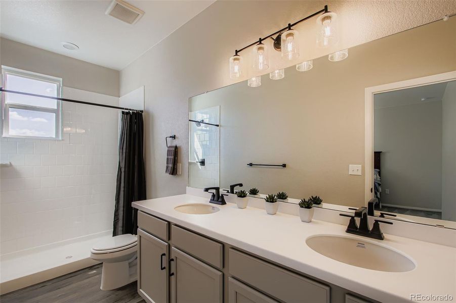 Furnished interior view inside a new home in Haskins Station, Arvada (Image 19).