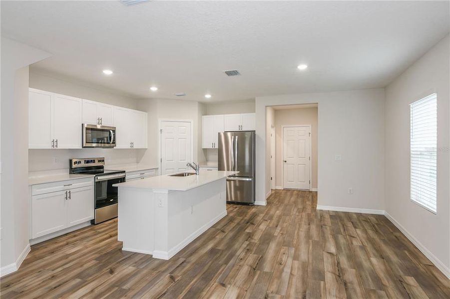 Furnished interior view inside a new home in Pasadena Woods, Dade City (Image 9).