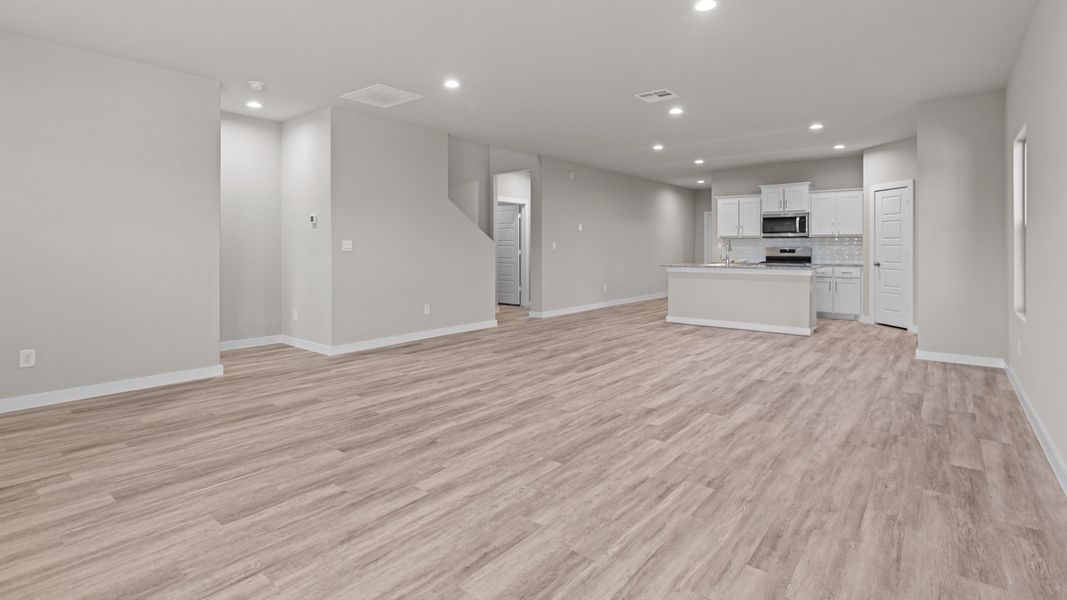 Representative unfurnished interior of a home built from the ROSEMONT by D.R. Horton in Homestead at Parks Bell Ranch, Odessa (Image 12).