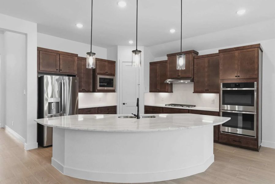 Representative furnished interior of a home built from the Mariah by Chesmar Homes in The Highlands, Porter (Image 4).