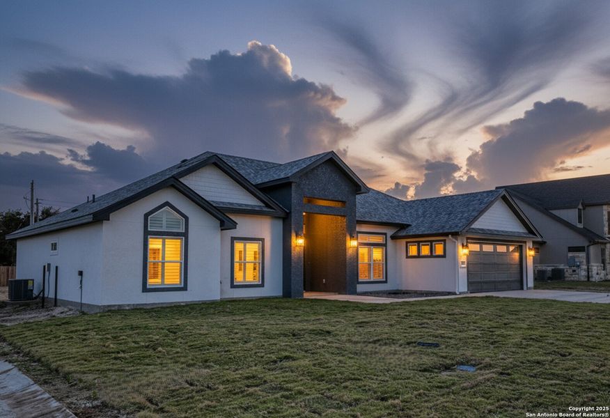 Front exterior of a new home in , Uvalde, TX, highlighting curb appeal (Image 23).