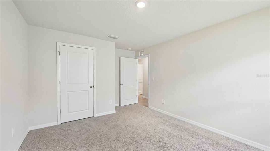 Spacious, unfurnished interior of a new home in Rye Crossing, Parrish (Image 18).
