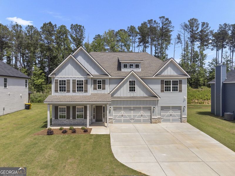 Front exterior of a new home in Juliette Crossing, Forsyth, GA, highlighting curb appeal (Image 30).