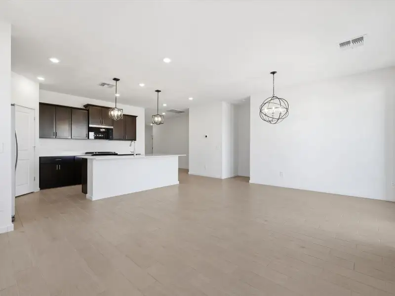 Spacious, unfurnished interior of a new home in Rancho Mirage Estate Series, Maricopa (Image 8).
