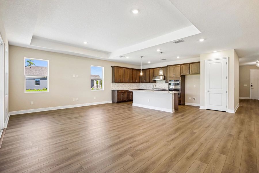 The family room welcomes you into this stunning kitchen space perfect for entertaining