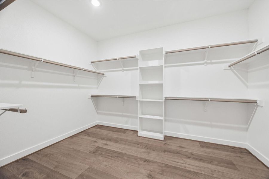 large walk in closet w. built ins, no carpet in the home. home is pre-wired.