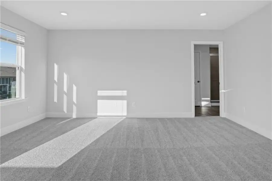 Spacious, unfurnished interior of a new home in Towns at Holly Springs, Holly Springs (Image 29).