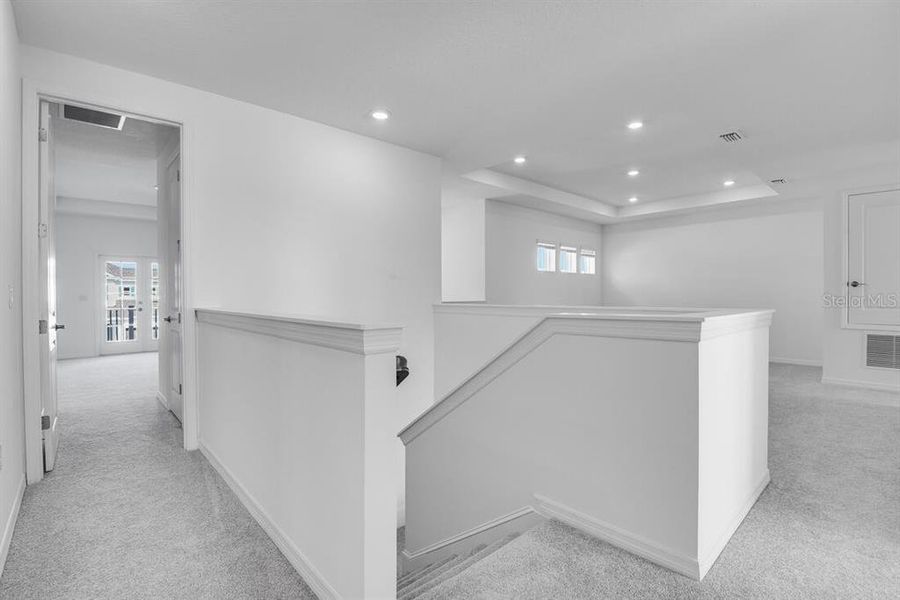 Spacious, unfurnished interior of a new home in Ardisia Park, New Smyrna Beach (Image 22).