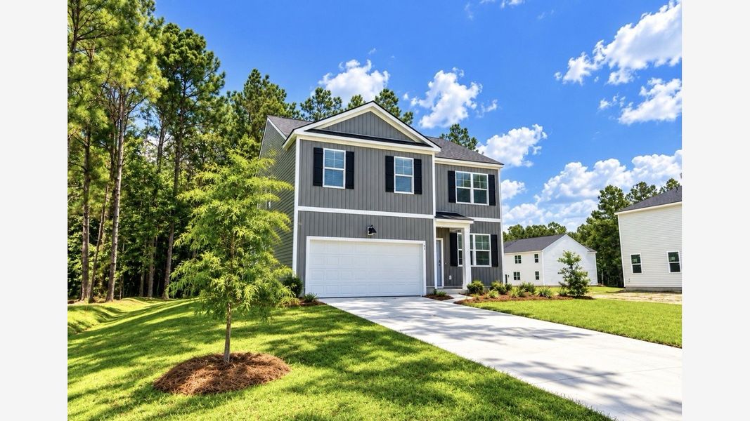Front exterior of a new home in Cypress Landing, Hardeeville, SC, highlighting curb appeal (Image 22). Front exterior of a new home in Cypress Landing, Hardeeville, SC, highlighting curb appeal (Image 22).