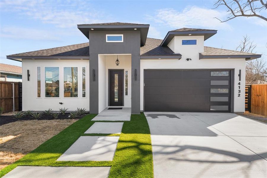 Front exterior of a new home in , Dallas, TX, highlighting curb appeal (Image 23).