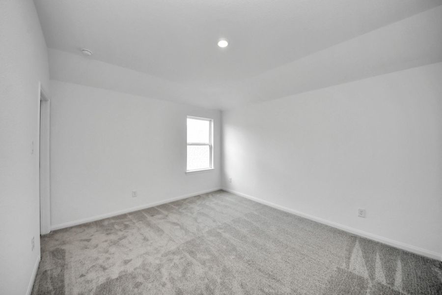 Spacious, unfurnished interior of a new home in 50' Traditional Homes at Elyson, Katy (Image 32).