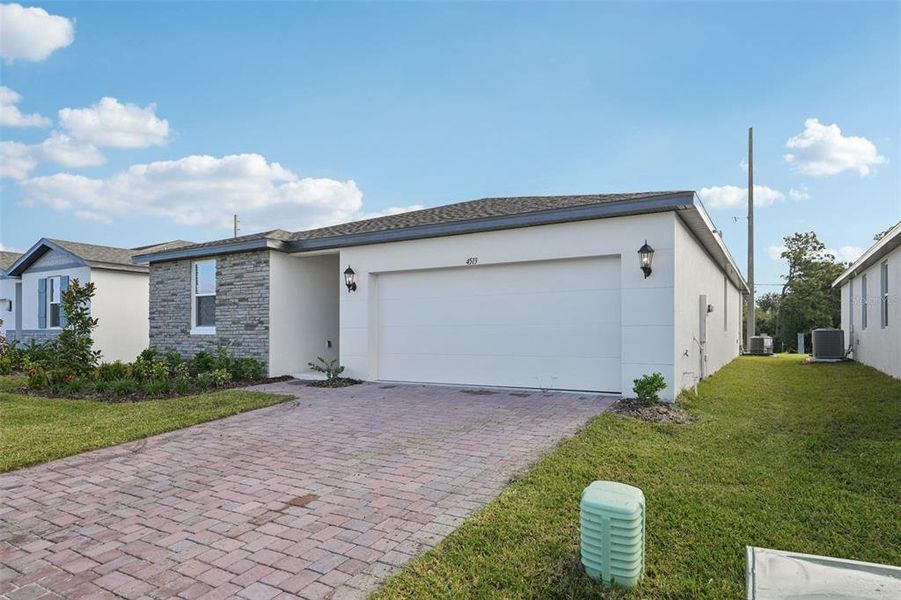 Exterior details and patio area of a home in The Meadow at Crossprairie, St. Cloud (Image 18).