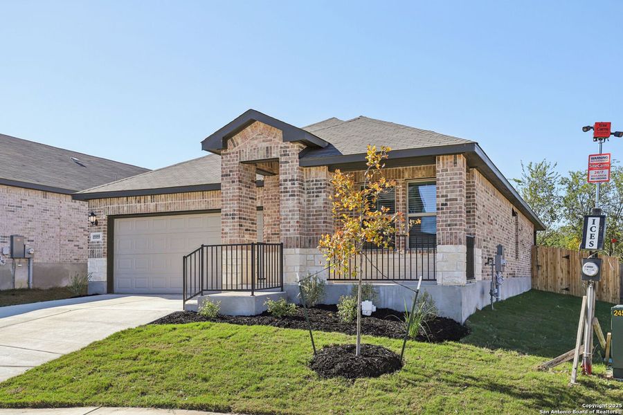 Front exterior of a new home in Comanche Ridge, San Antonio, TX, highlighting curb appeal (Image 22).