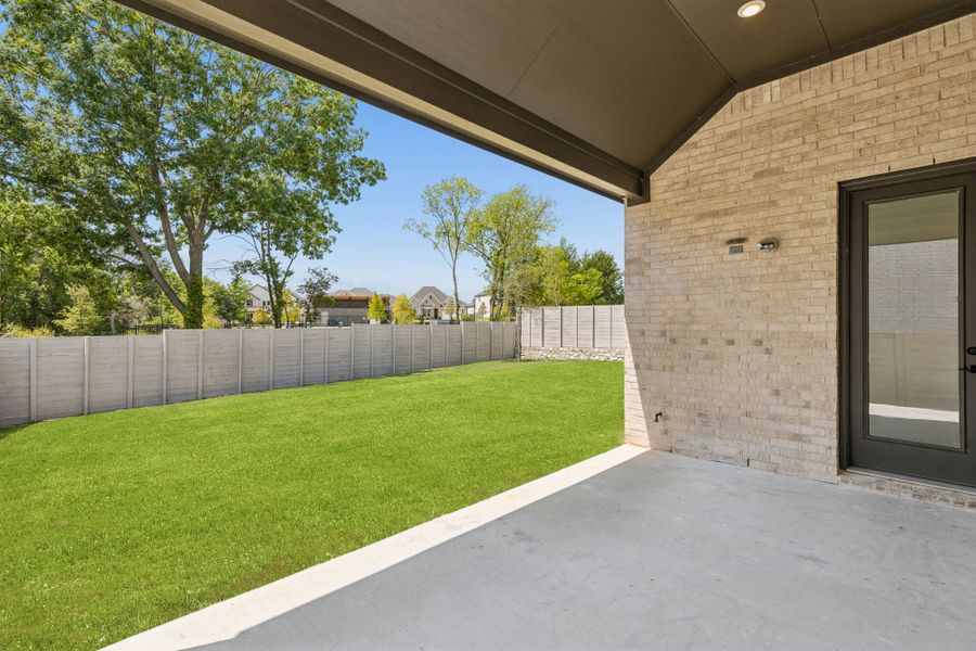 Exterior details and patio area of a home in Painted Tree Lakeside, McKinney (Image 22). Exterior details and patio area of a home in Painted Tree Lakeside, McKinney (Image 22).