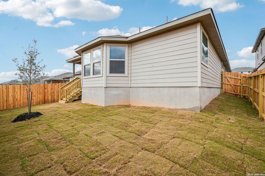 Exterior details and patio area of a home in Lark Canyon, New Braunfels (Image 21).