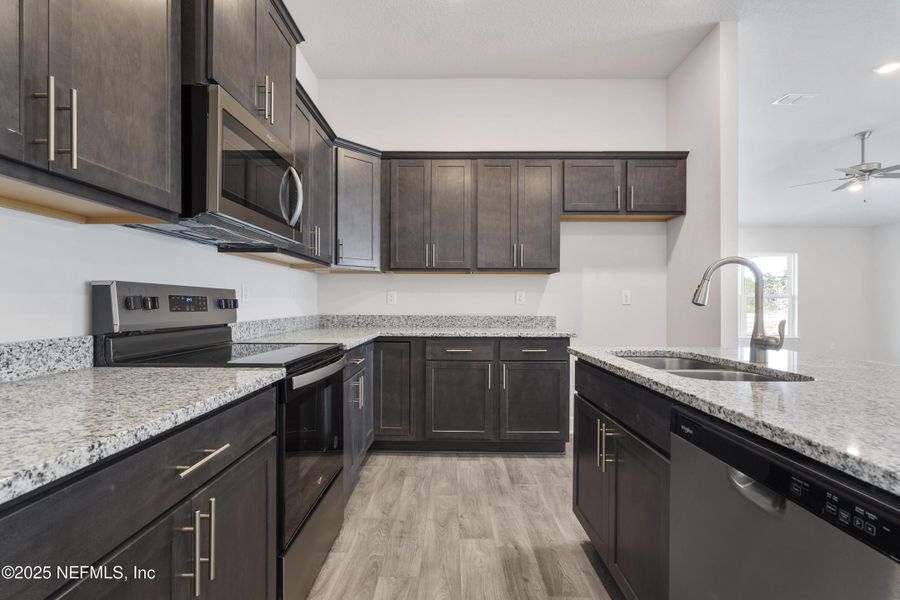 Furnished interior view inside a new home in Shadow Crest at Rolling Hills, Green Cove Springs (Image 3).
