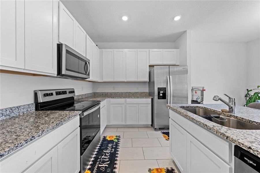 Furnished interior view inside a new home in Cypress Park Estates, Haines City (Image 12).
