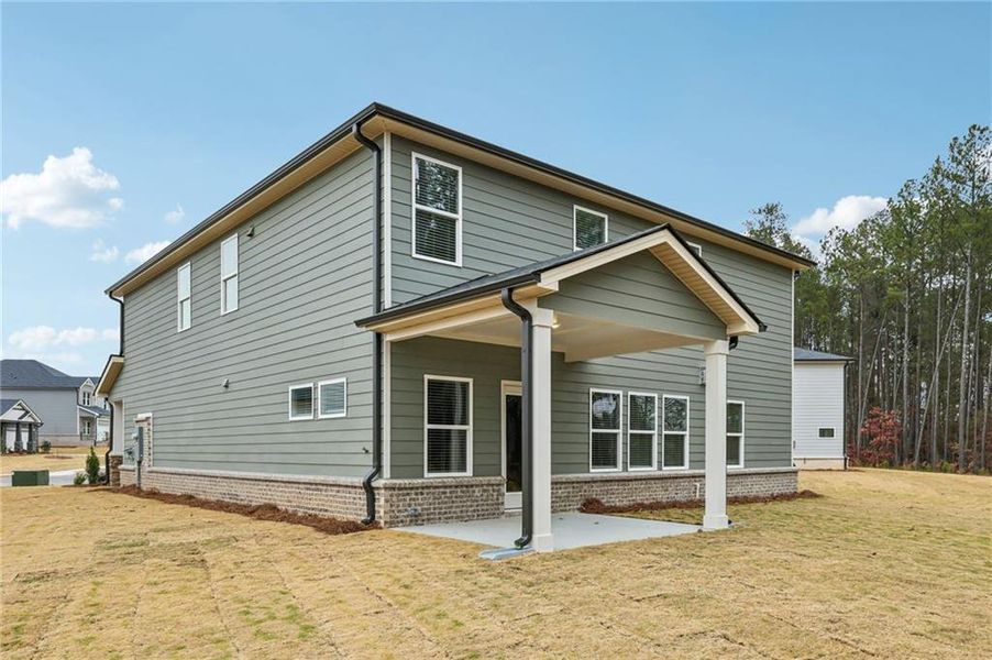 Exterior details and patio area of a home in Parkside at Grayson, Grayson (Image 3).