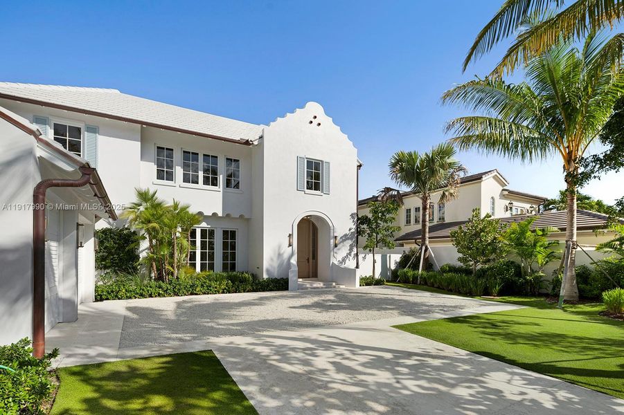 Front exterior of a new home in , Palm Beach, FL, highlighting curb appeal (Image 32). Front exterior of a new home in , Palm Beach, FL, highlighting curb appeal (Image 32).