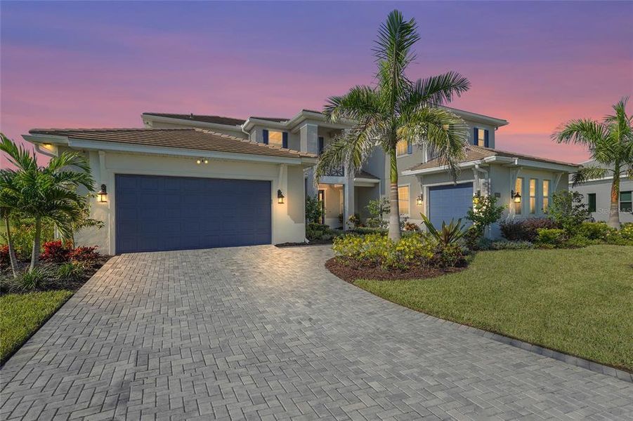 Front exterior of a new home in , Lakewood Ranch, FL, highlighting curb appeal (Image 22).