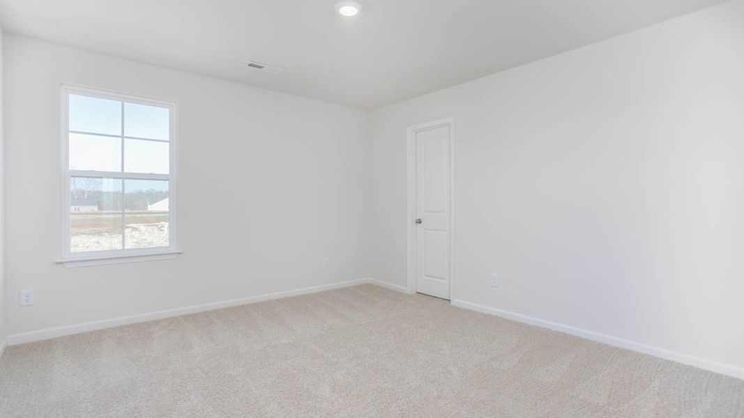 Representative unfurnished interior of a home built from the Kyle by D.R. Horton in Country Creek, Lexington (Image 28).