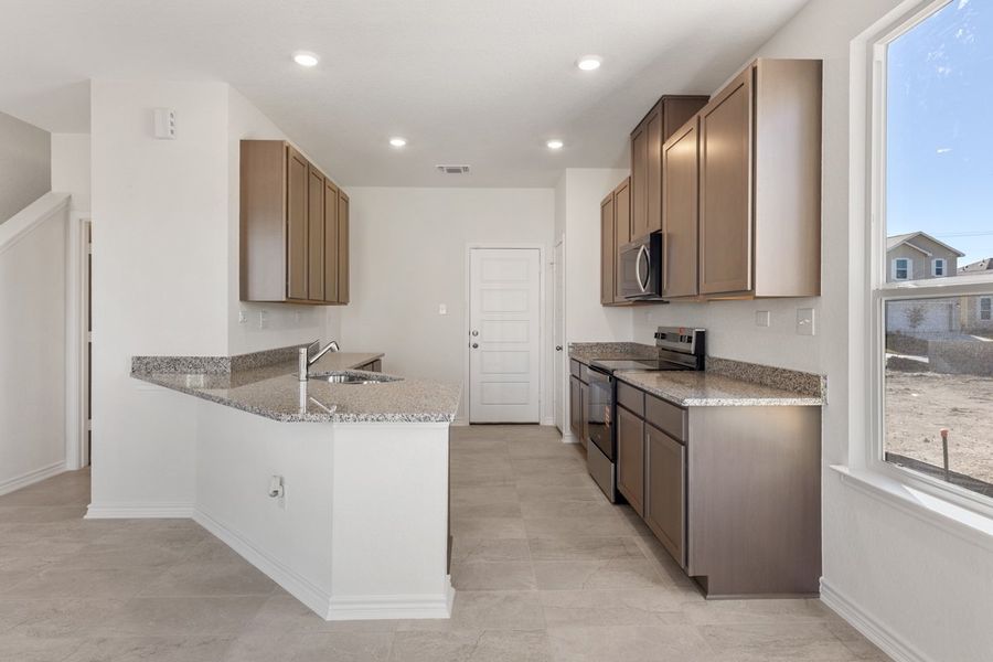 Furnished interior view inside a new home in Spanish Trails Villas, San Antonio (Image 4).