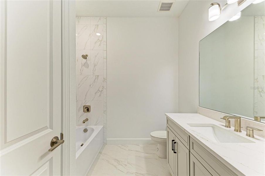 Furnished interior view inside a new home in Esplanade at Azario Lakewood Ranch, Lakewood Ranch (Image 17). Furnished interior view inside a new home in Esplanade at Azario Lakewood Ranch, Lakewood Ranch (Image 17).