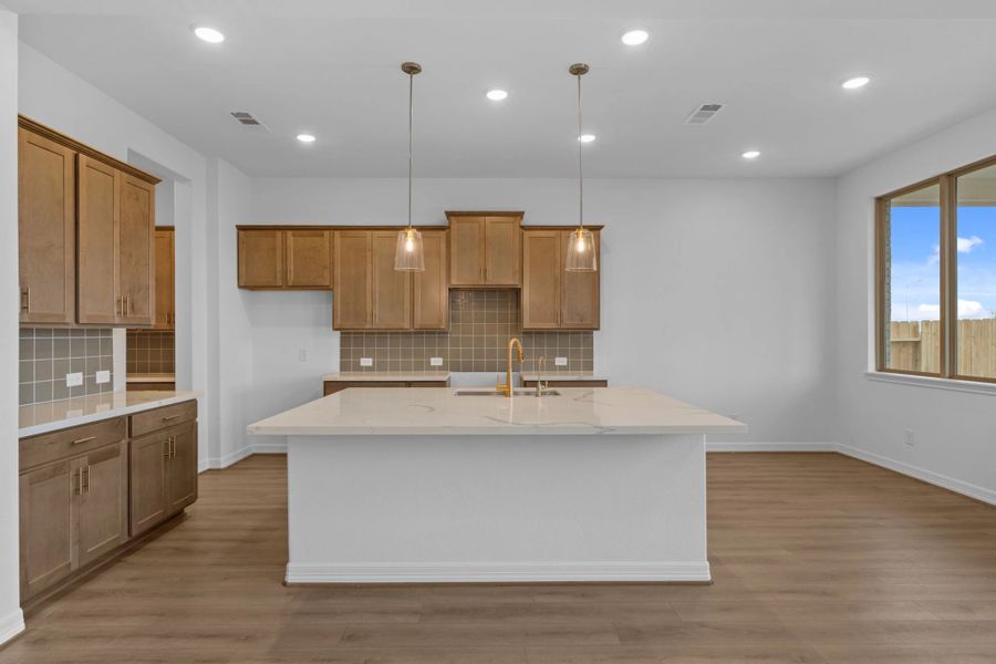 Kitchen. Sample product photo. Actual exterior and interior selections may vary by homesite. Photo may be virtually staged.