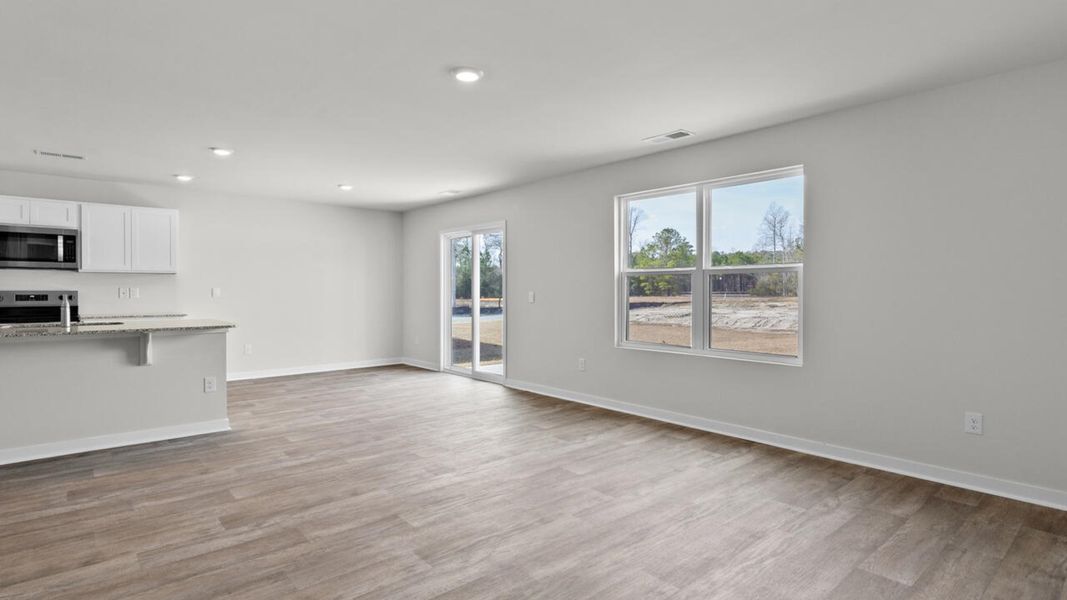 Spacious, unfurnished interior of a new home in Sidbury Station, Castle Hayne (Image 14).