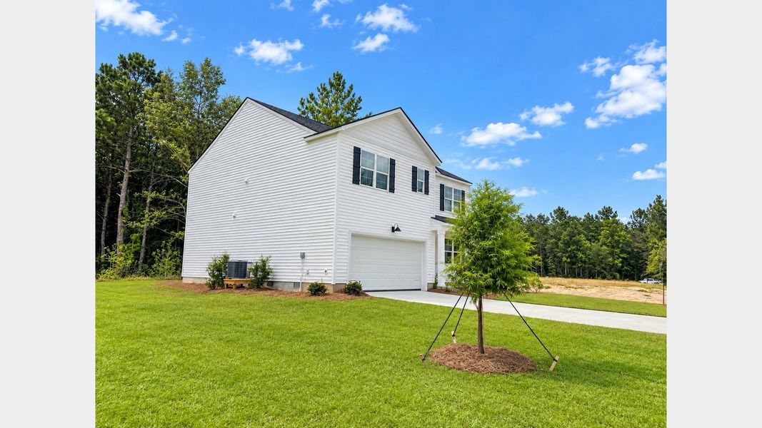 Front exterior of a new home in Cypress Landing, Hardeeville, SC, highlighting curb appeal (Image 24).