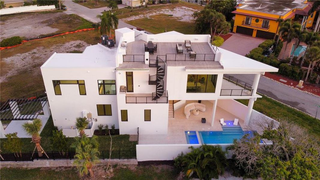 Exterior details and patio area of a home in , Longboat Key (Image 45).