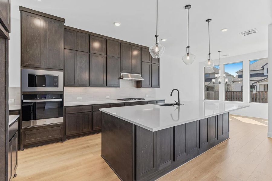 Furnished interior view inside a new home in Parmer Ranch 60, Georgetown (Image 17).