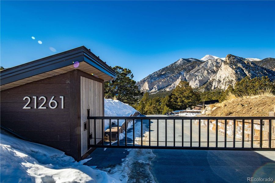 Gated and private entrance with paved driveway Gated and private entrance with paved driveway