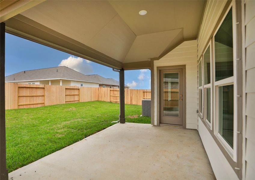 Exterior details and patio area of a home in Aldeana, Bonney (Image 3).