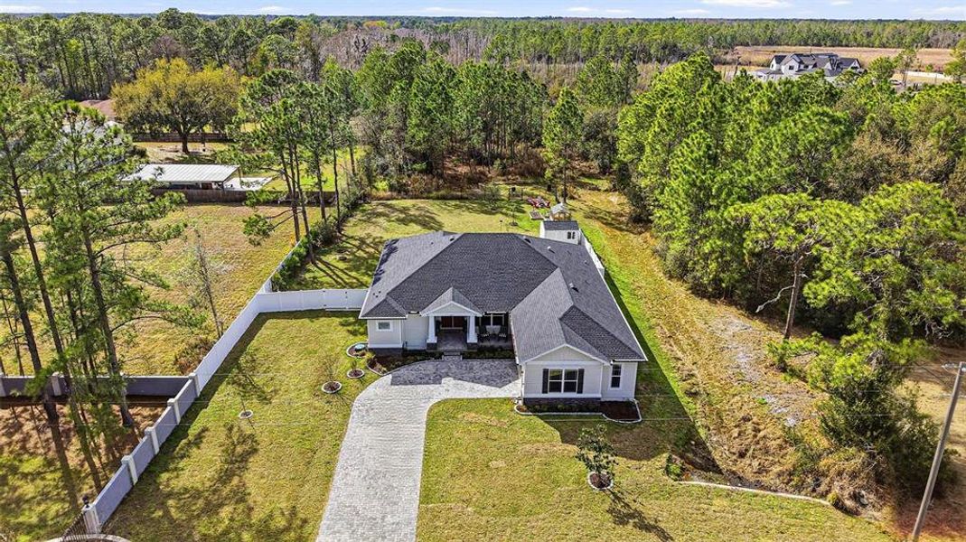 Front exterior of a new home in , Wesley Chapel, FL, highlighting curb appeal (Image 22).