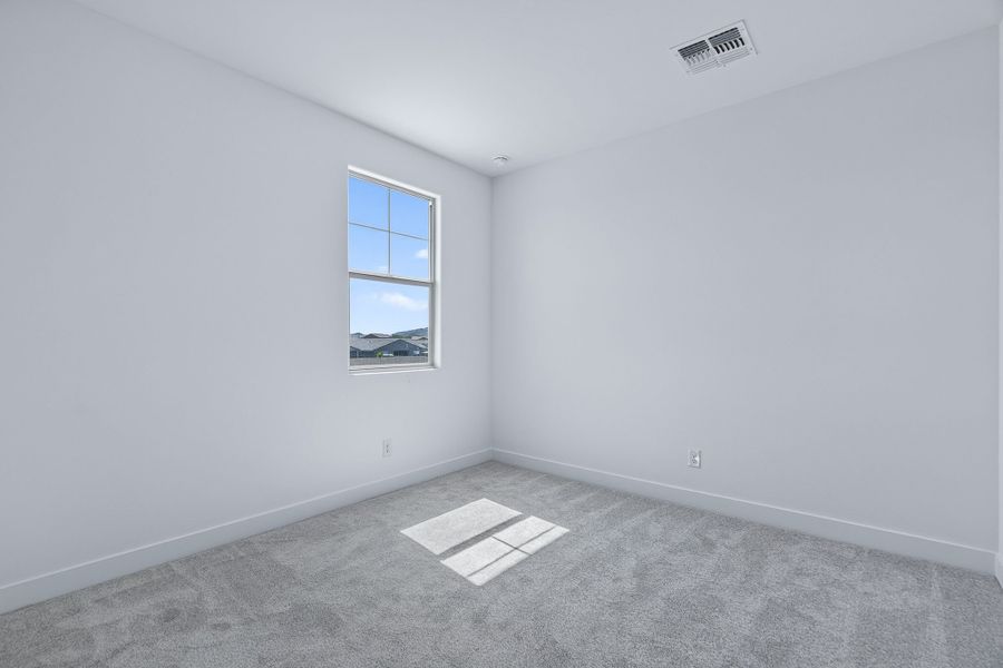 Spacious, unfurnished interior of a new home in The Grove at El Cidro, Goodyear (Image 37).