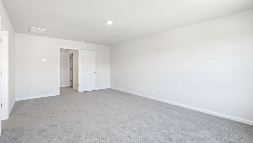 Spacious, unfurnished interior of a new home in Durbin Meadows Traditions, Fountain Inn (Image 29).